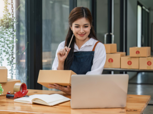 A woman organizing her business files on OneDrive.