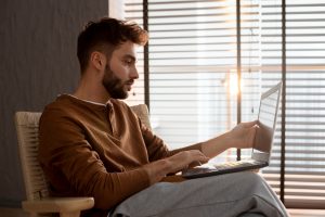 A photo of a person working on a laptop: Is Convenience Worth the Risk?